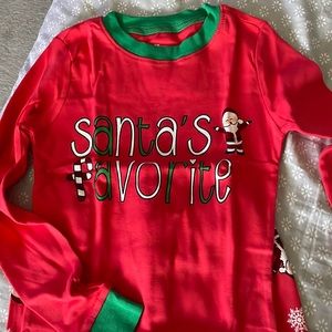 Children’s unisex long sleeve Christmas pjs. NWT